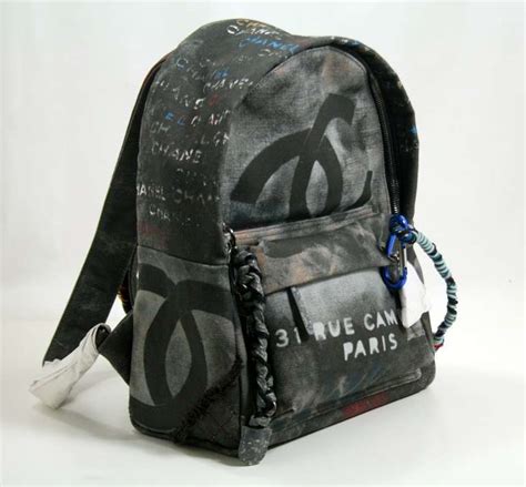 chanel art school backpack graffiti medium black|chanel graffiti suits.